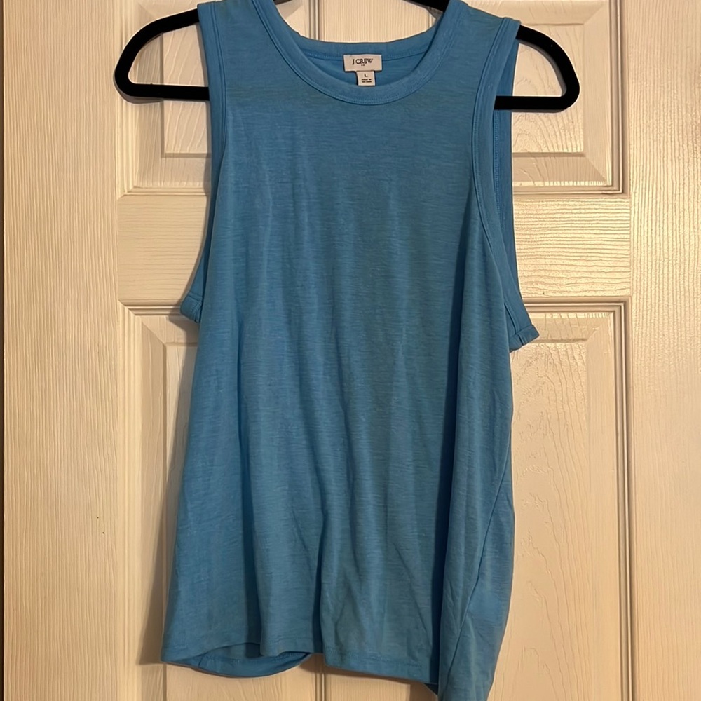 J. Crew blue tank top with slit in the back that ties at the bottom.